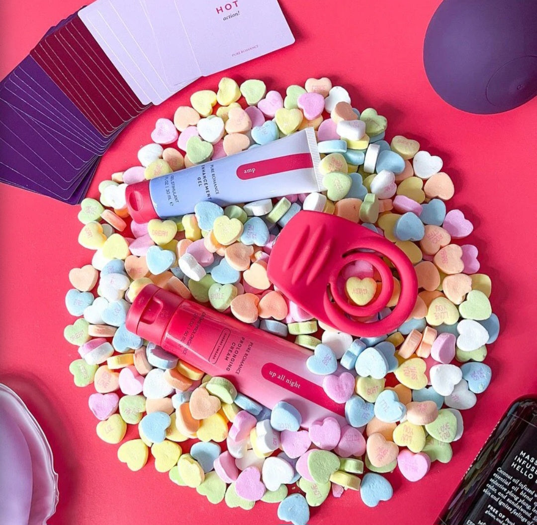 penis restriction ring sex toy on a pile of candy hearts